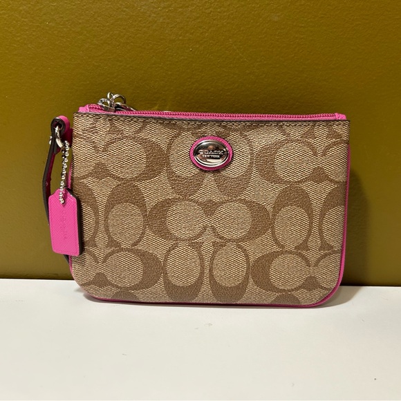 Coach Handbags - Coach Brown and Pink Signature Wristlet NWOT